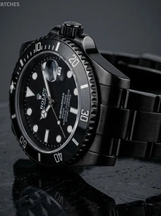 Black wristwatch with a reflective surface on a dark background, featuring the Willi Watches logo.