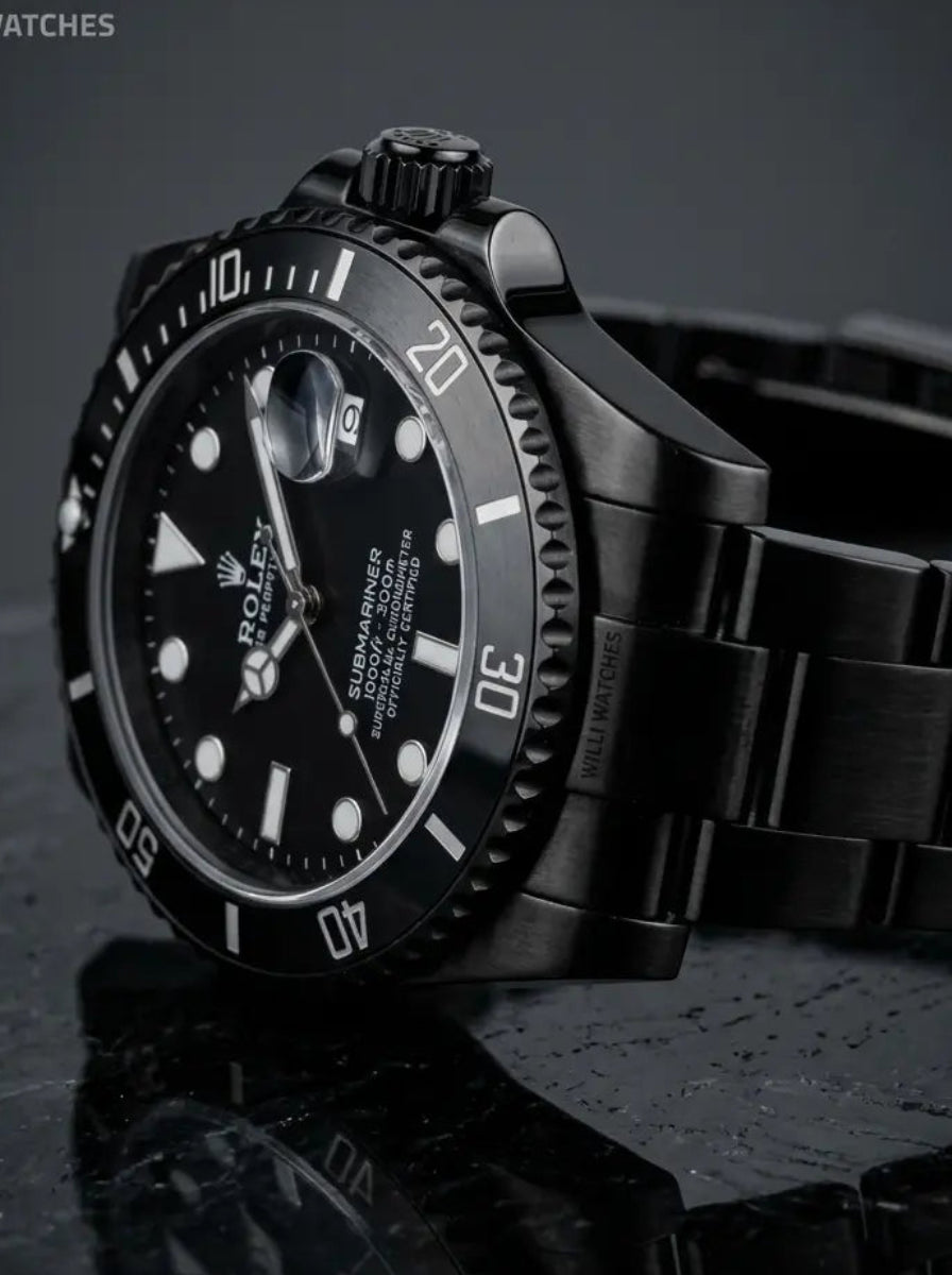 Black wristwatch with a reflective surface on a dark background, featuring the Willi Watches logo.
